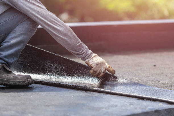 Professional Basement Waterproofing technician working in Watauga, TN
